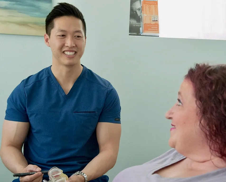 Dentist Santa Clara CA Doctor and patient Smiling in Office